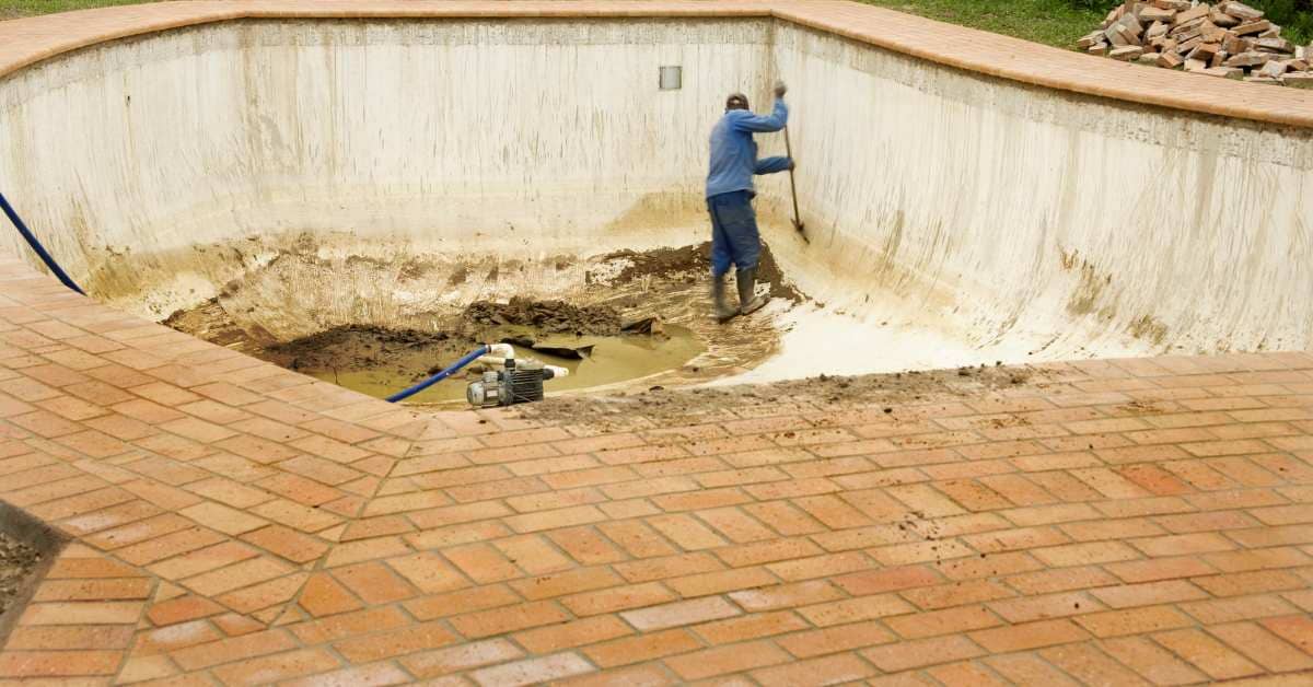 an pool expert is resurfacing pool